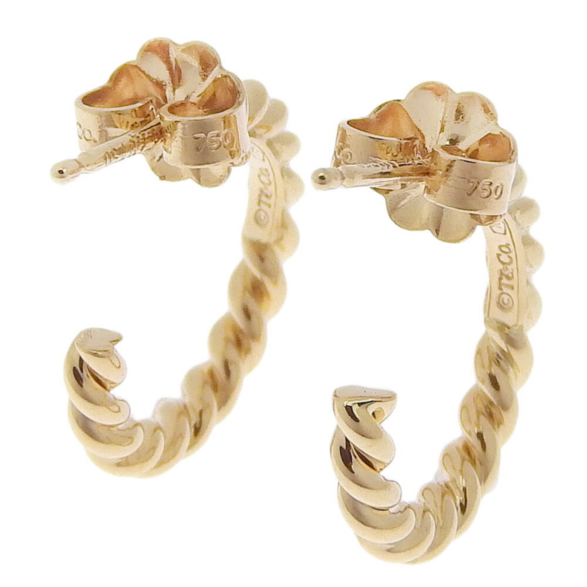 Tiffany & Co. Twisted hoop motif earrings in 18K yellow gold