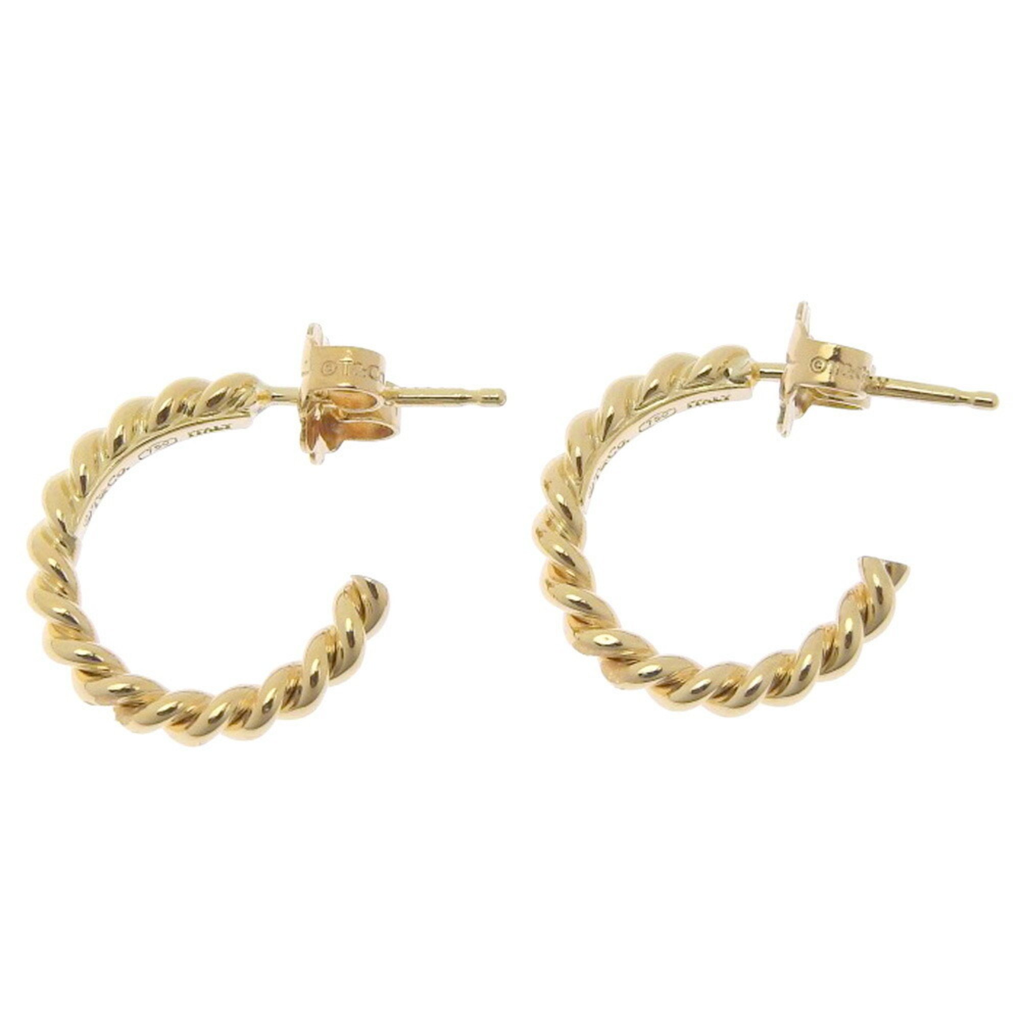 Tiffany & Co. Twisted hoop motif earrings in 18K yellow gold