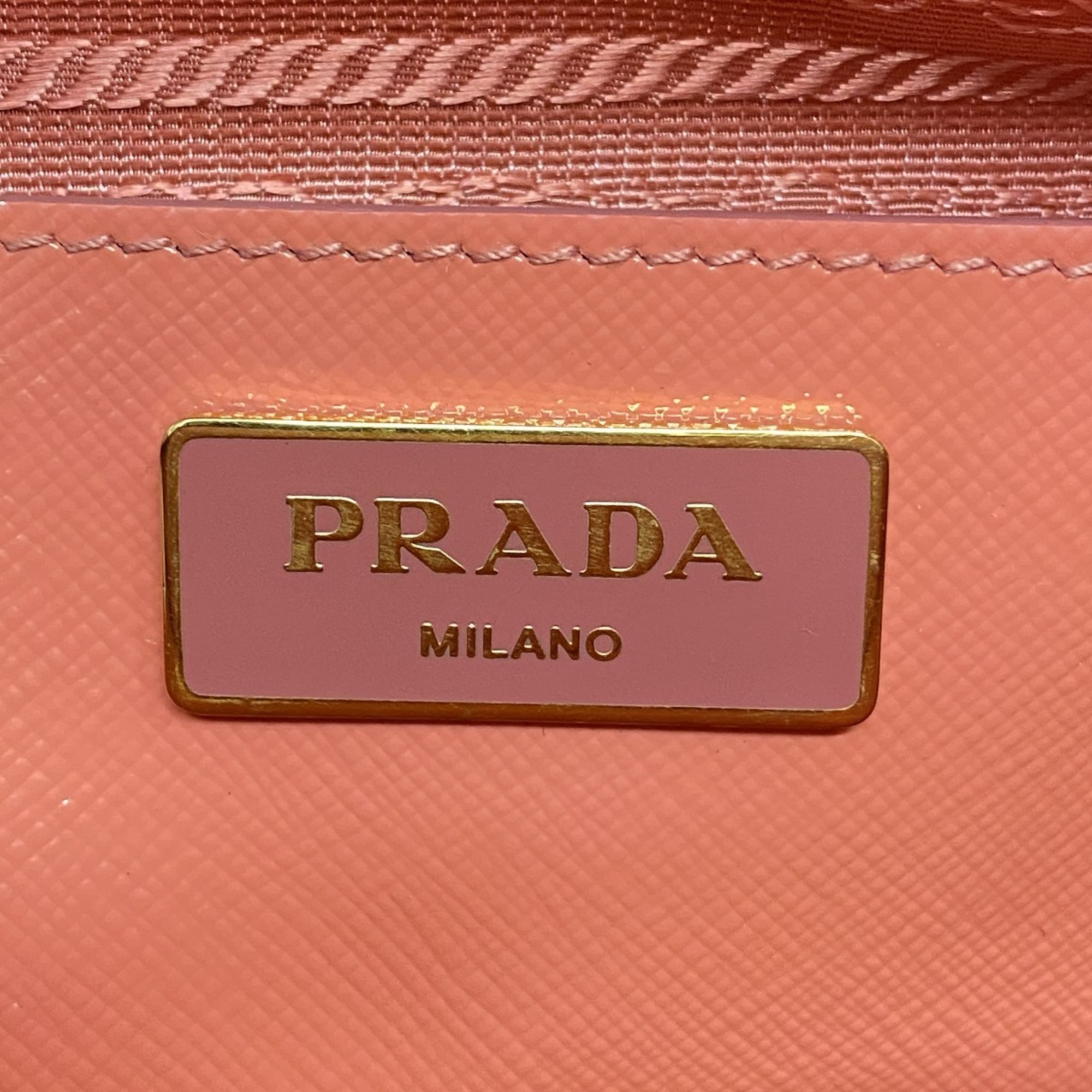 Prada handbag saffiano enamel coral for women