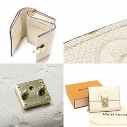 Louis Vuitton Portefeuille Metis Compact Crème Monogram Empreinte M81071 Tri-fold Wallet