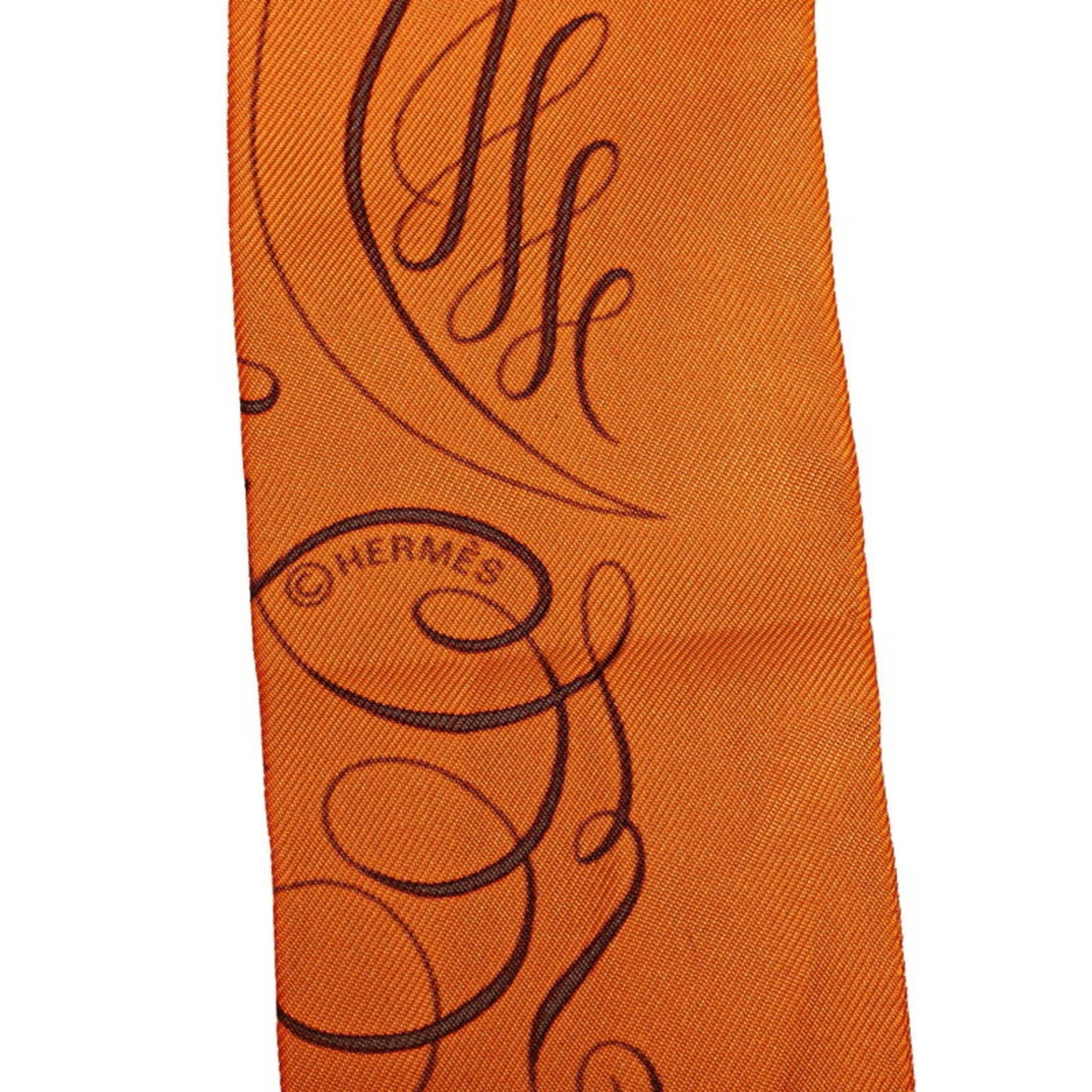 Hermes Twilly "Exercice pour foumer la main (give a hand)" Scarf Muffler Orange Brown Silk Women's HERMES