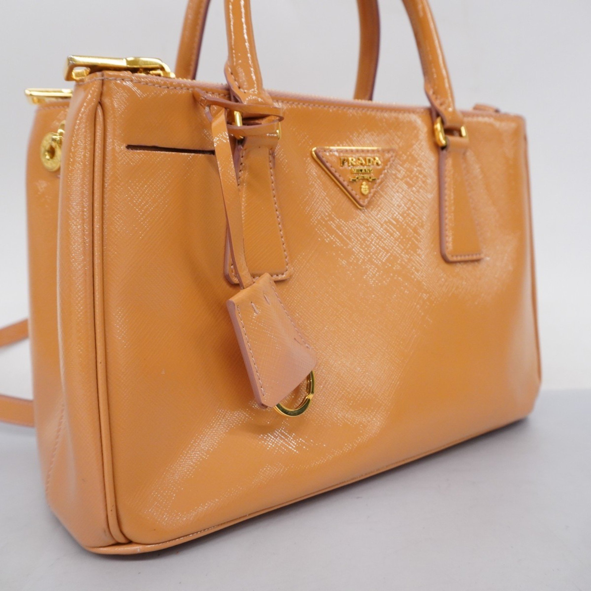 Prada handbag saffiano enamel beige ladies