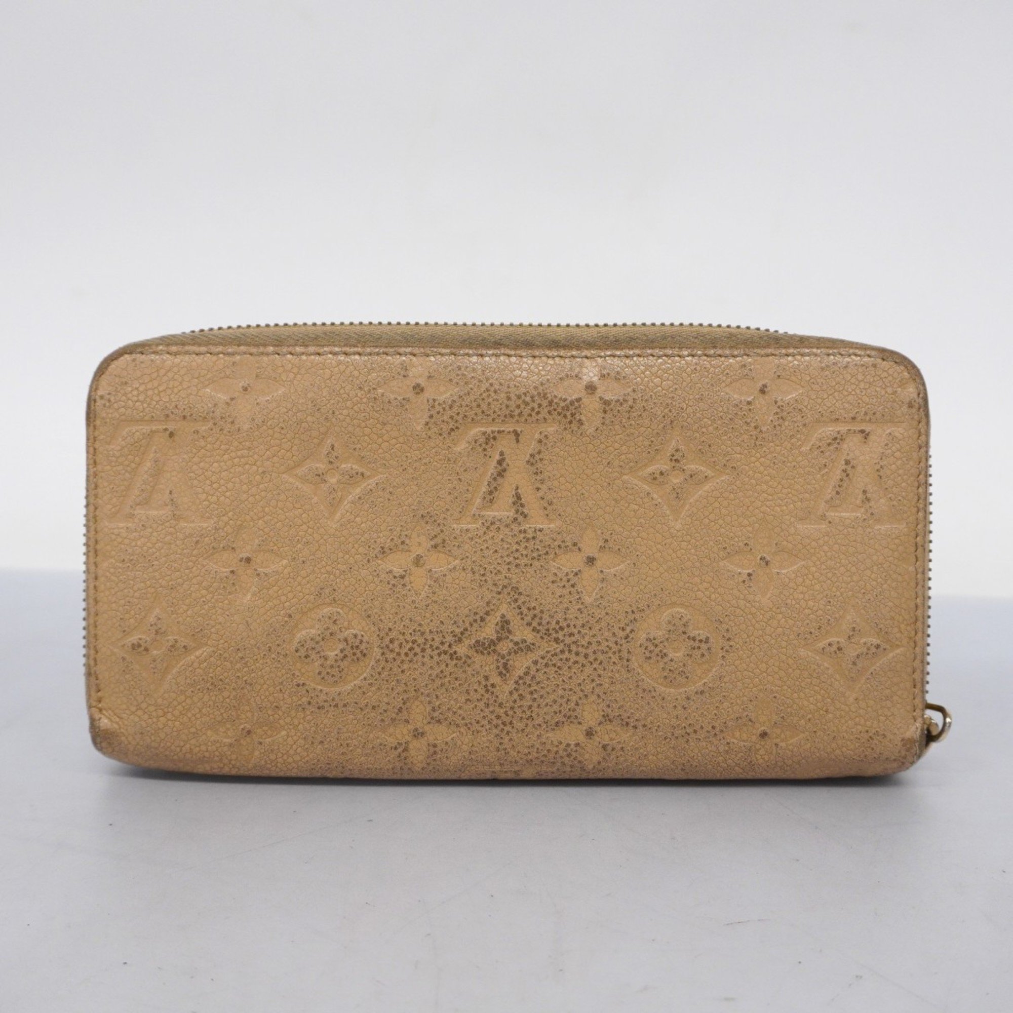 Louis Vuitton Long Wallet Monogram Empreinte Zippy M60746 Dune Women's