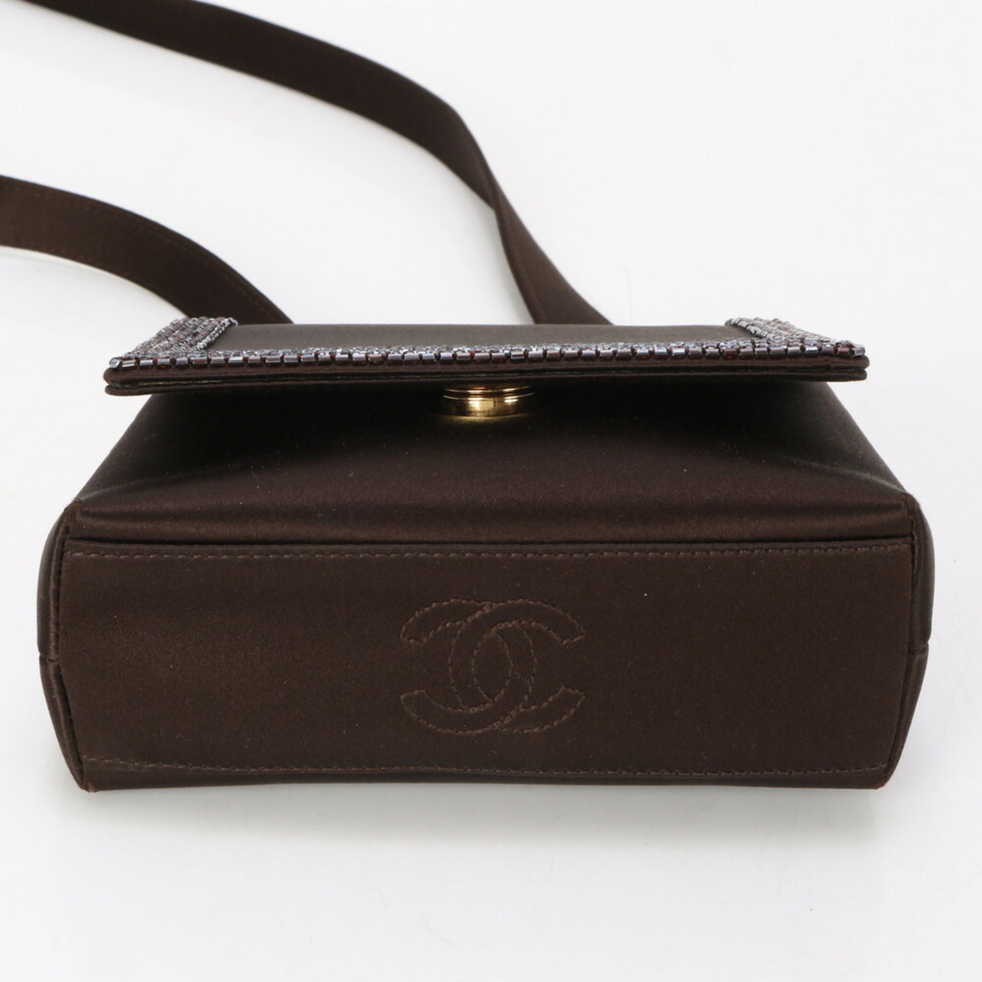 Chanel guarantee card with serial number seal, beaded shoulder bag