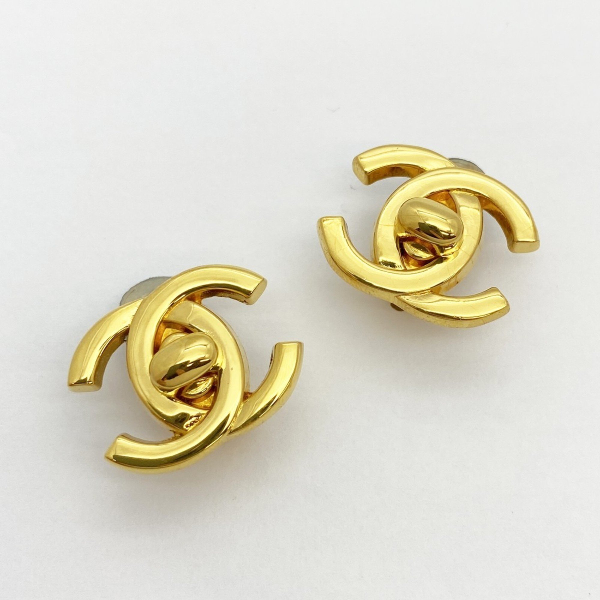 Chanel earrings turn lock GP plated gold ladies