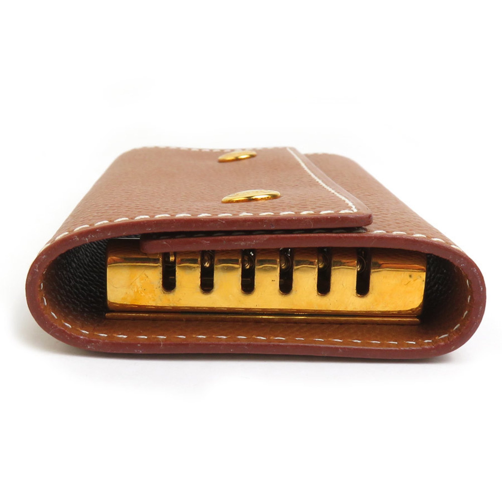 Hermes HERMES key case Serie leather metal brown gold men women e59519a