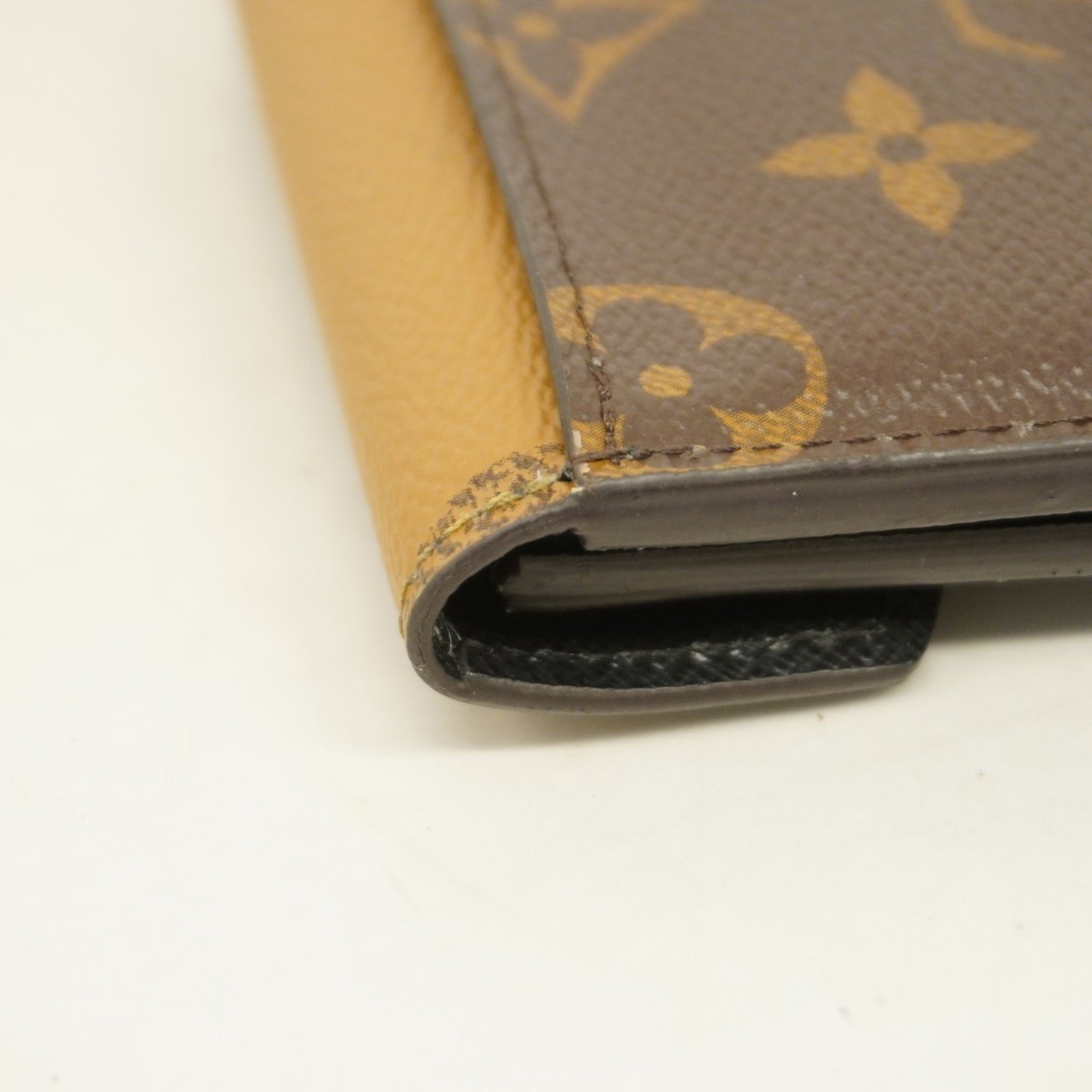 Louis Vuitton Tri-fold Wallet Monogram Reverse Portefeuille Zoe M80725 Brown Women's