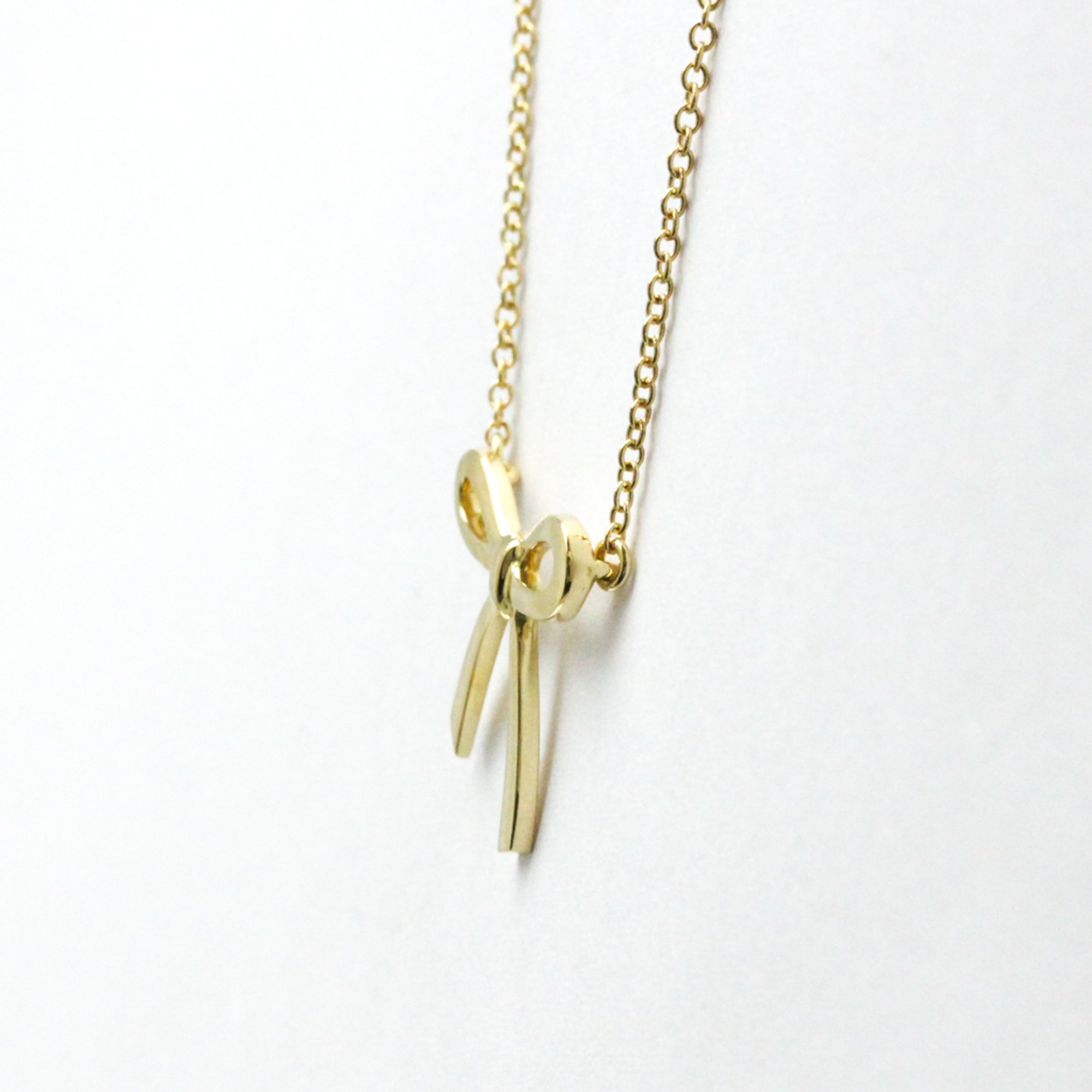 Tiffany Bow Ribbon Necklace Yellow Gold (18K) No Stone Men,Women Fashion Pendant Necklace (Gold)